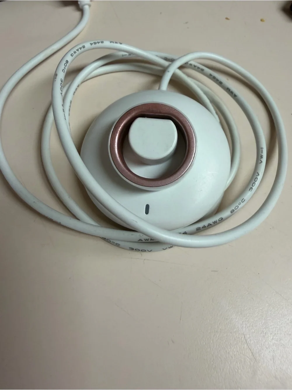White Smart Wearable Ring Charger Dock with Rose Gold Accent